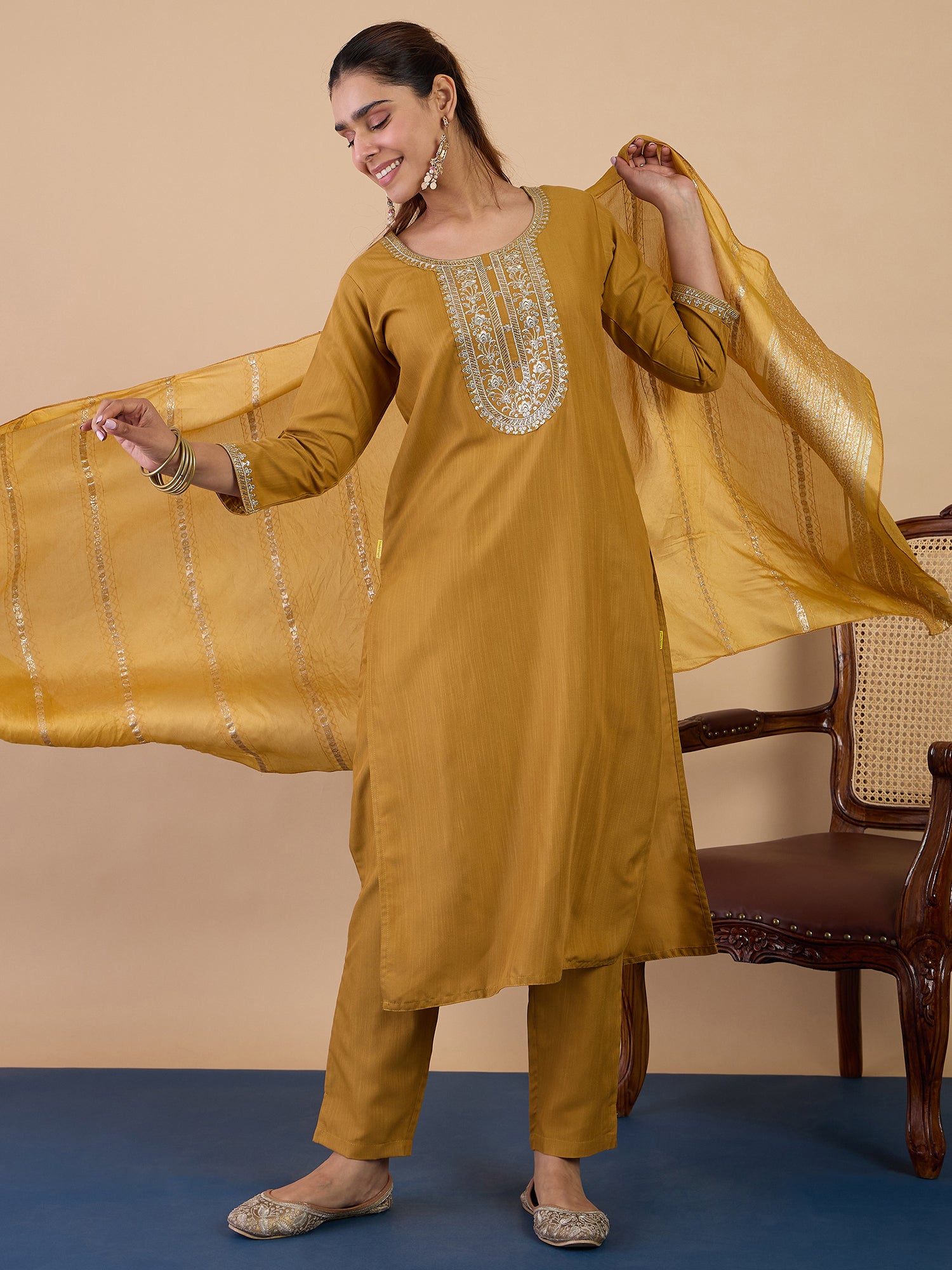 Tanvi Women's Mustard Festive Kurta Set with Patterned Border Dupatta