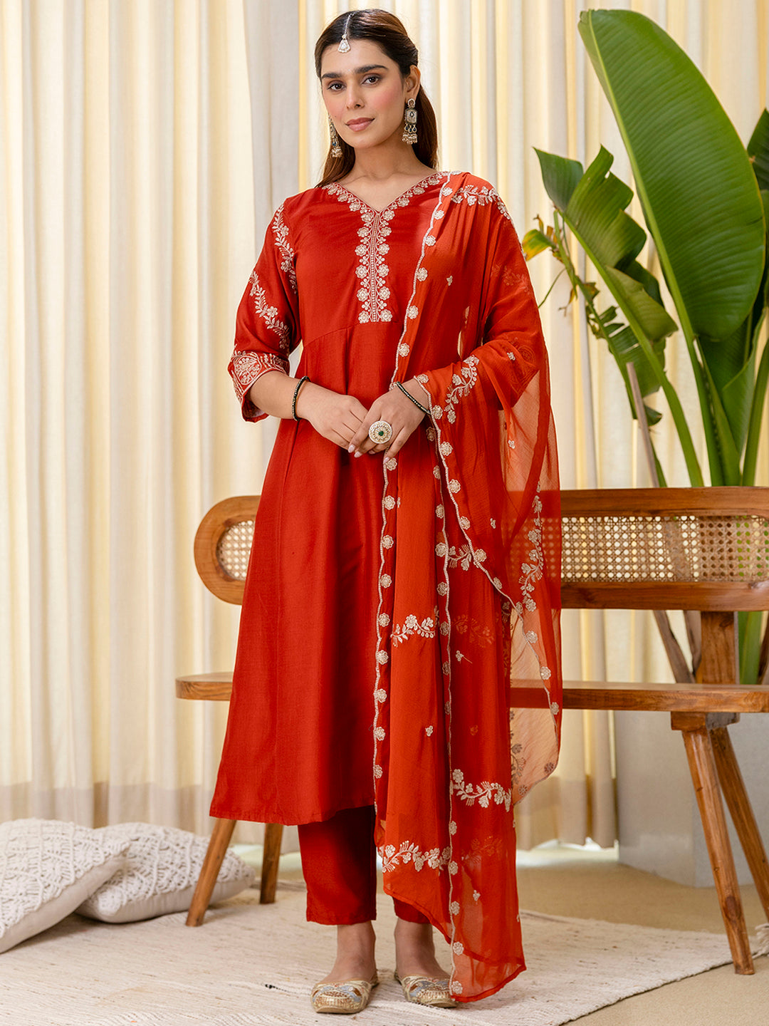 Navya Women's Rust Orange Festive Straight Kurta with Embroidered Neckline