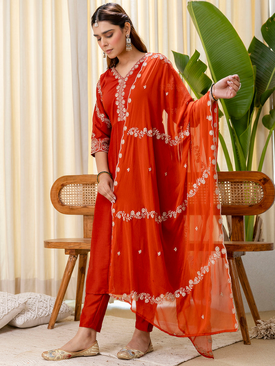 Navya Women's Rust Orange Festive Straight Kurta with Embroidered Neckline