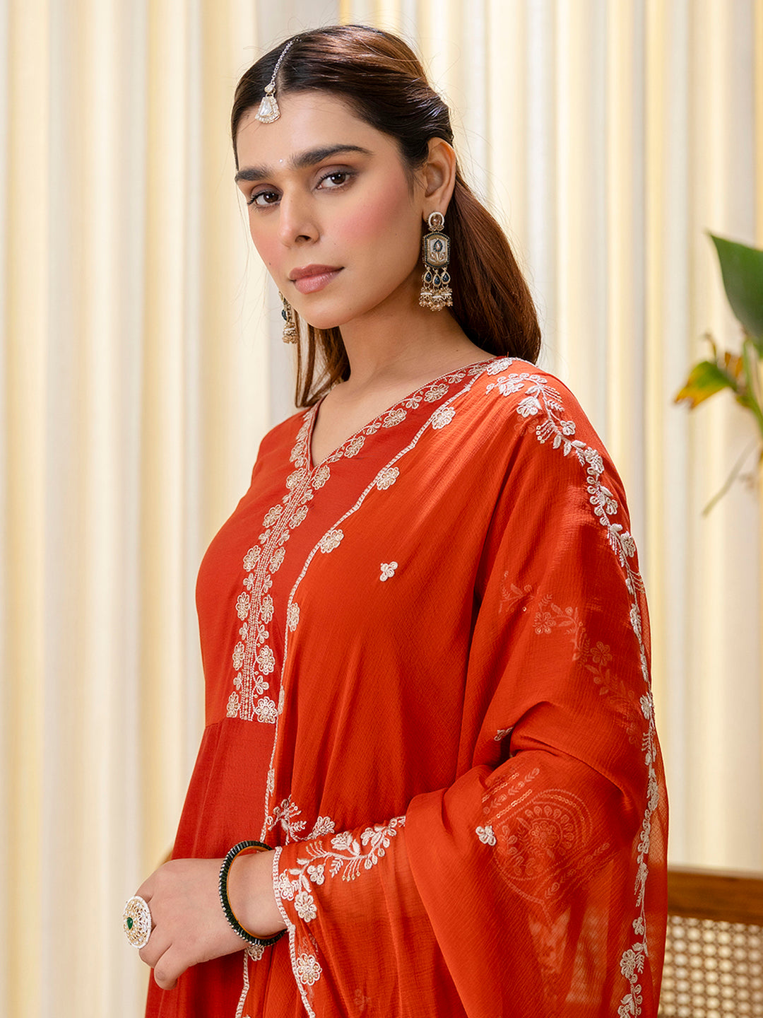 Navya Women's Rust Orange Festive Straight Kurta with Embroidered Neckline