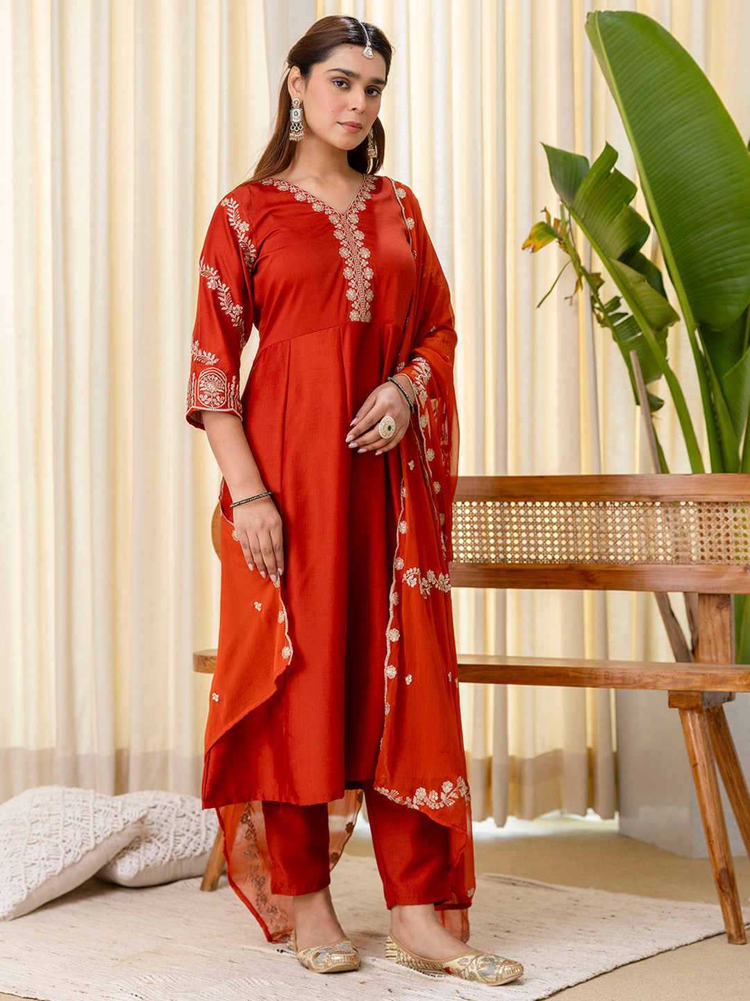 Navya Women's Rust Orange Festive Straight Kurta with Embroidered Neckline