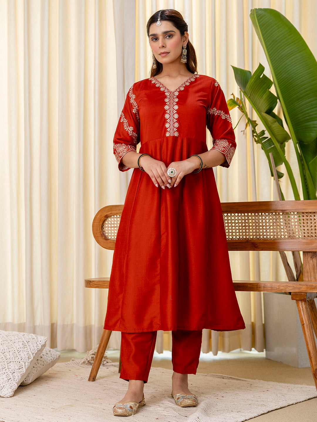 Navya Women's Rust Orange Festive Straight Kurta with Embroidered Neckline