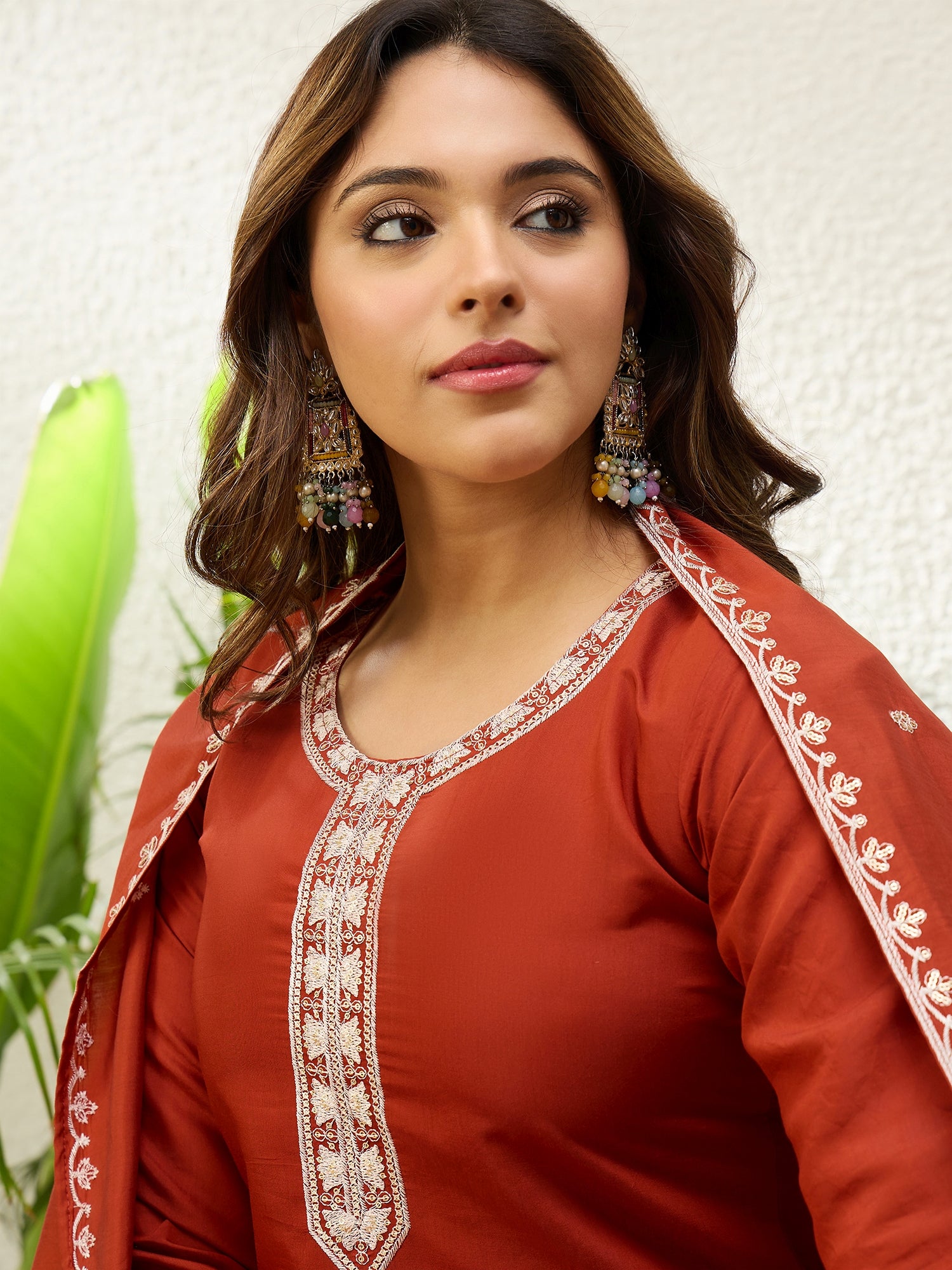 Vasundhara Women's Rust Silk Blend Embroidered Yoke Kurta Set