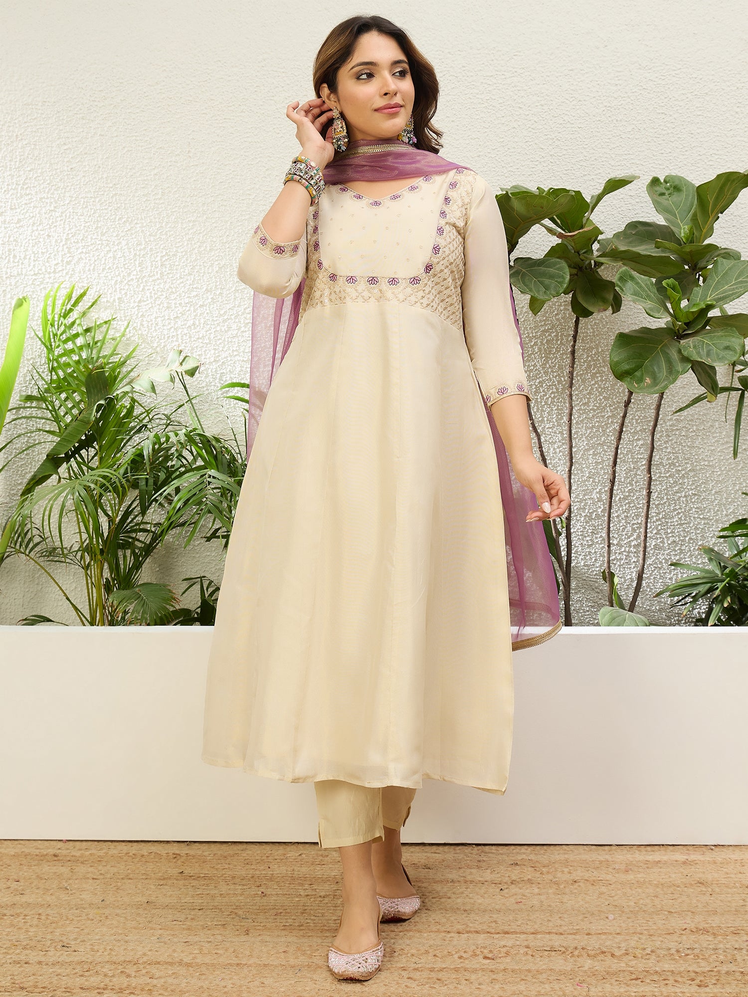 Gauri Women's Cream Festive Embroidered Yoke Flared Kurta Set