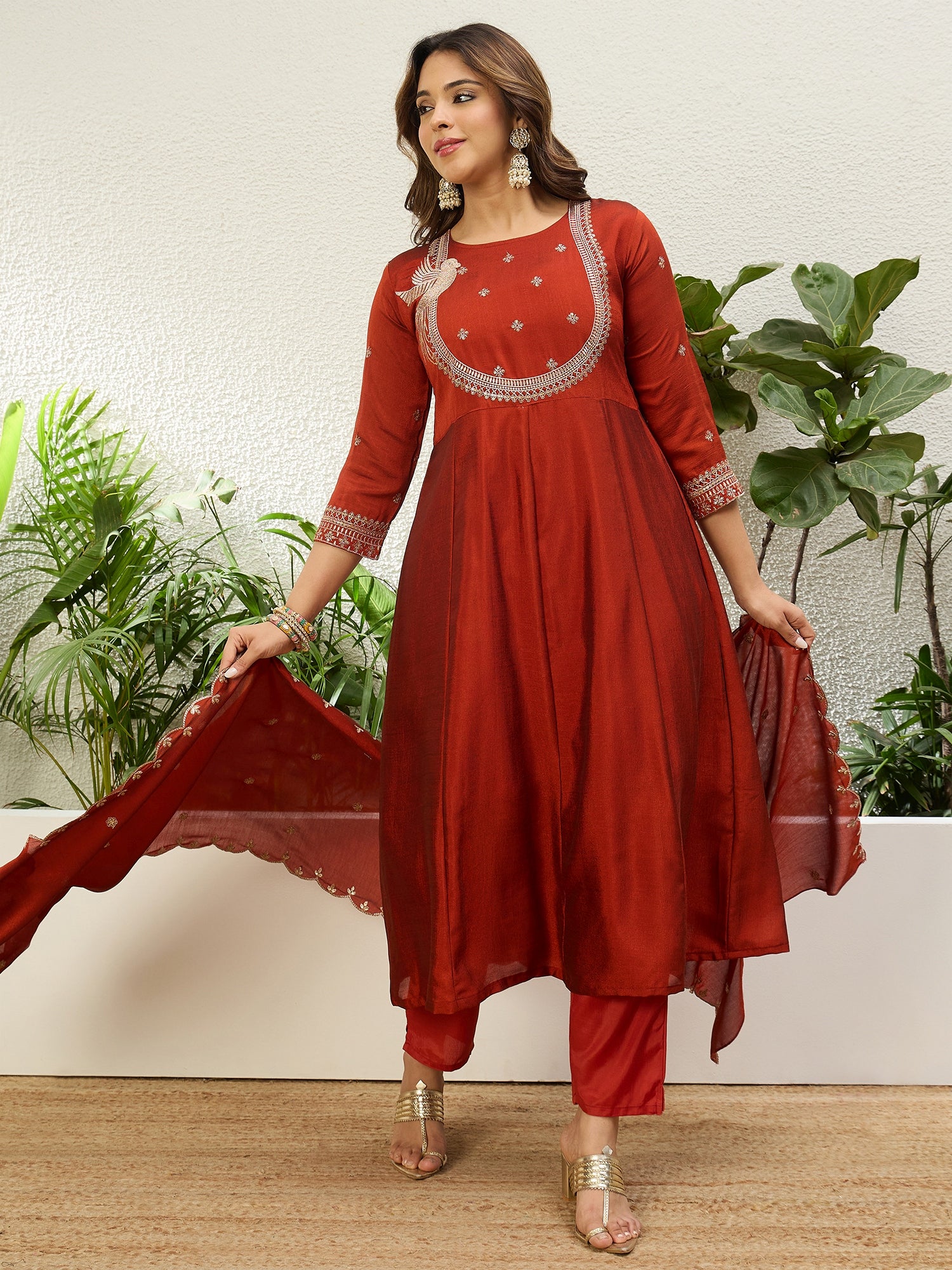 Vasundhara Women's Rust Red Embroidered Neckline Anarkali Kurta Set