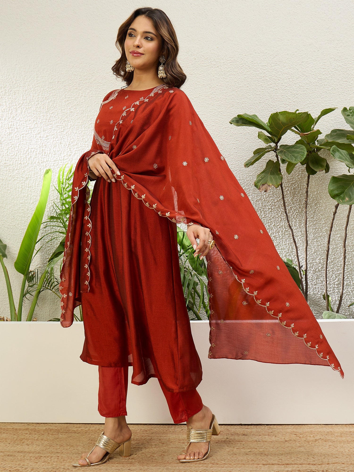 Vasundhara Women's Rust Red Embroidered Neckline Anarkali Kurta Set