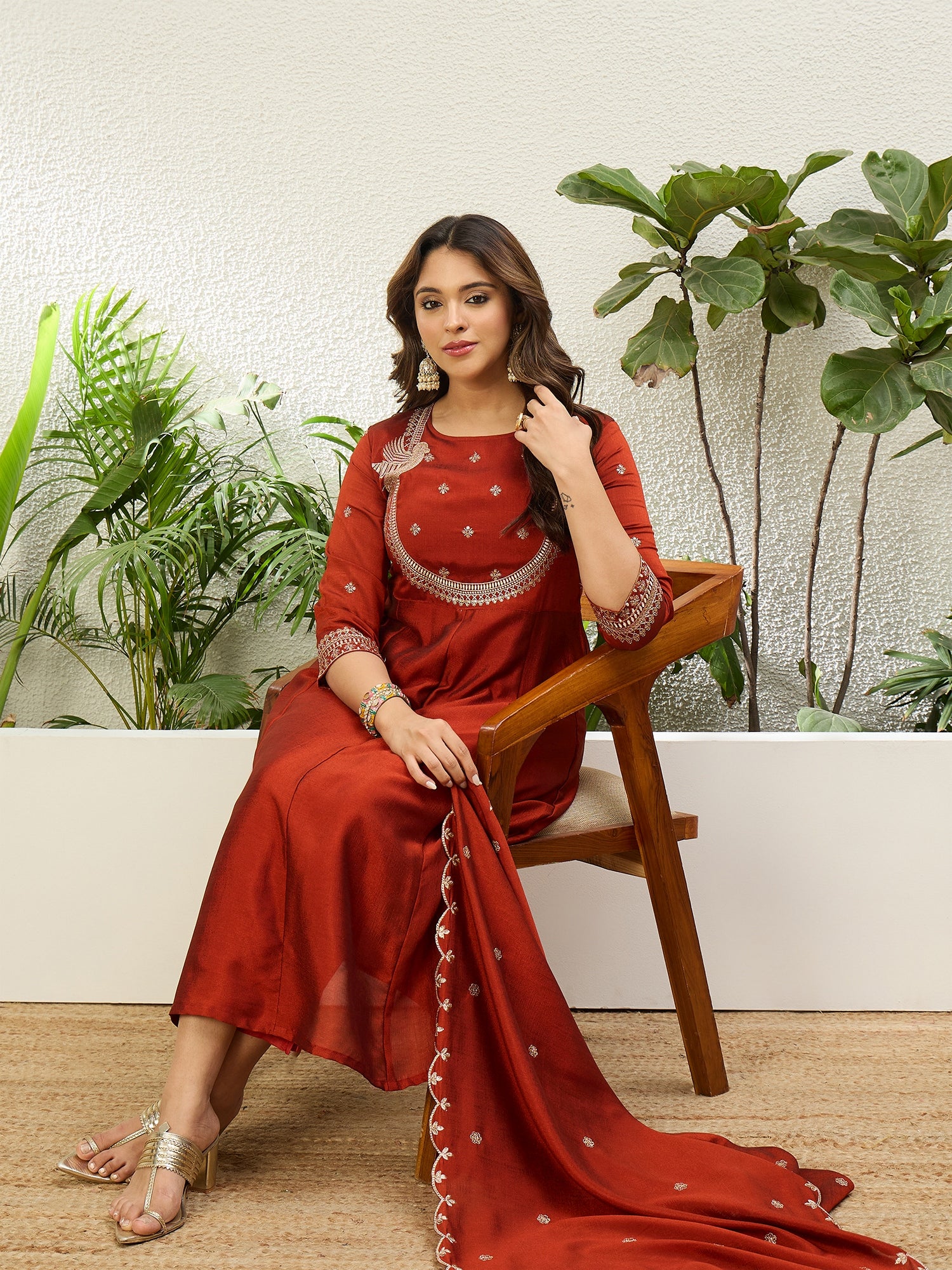 Vasundhara Women's Rust Red Embroidered Neckline Anarkali Kurta Set