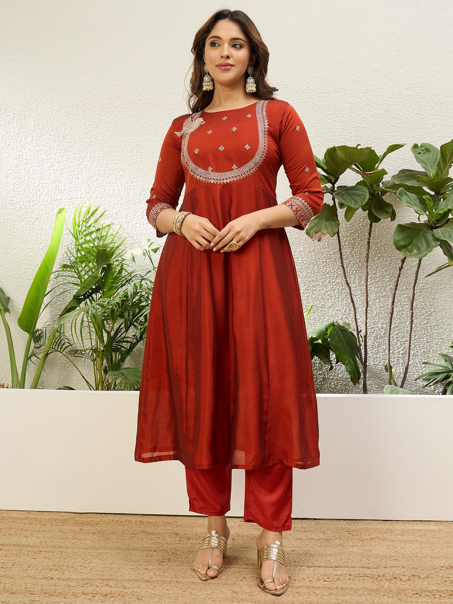 Vasundhara Women's Rust Red Embroidered Neckline Anarkali Kurta Set