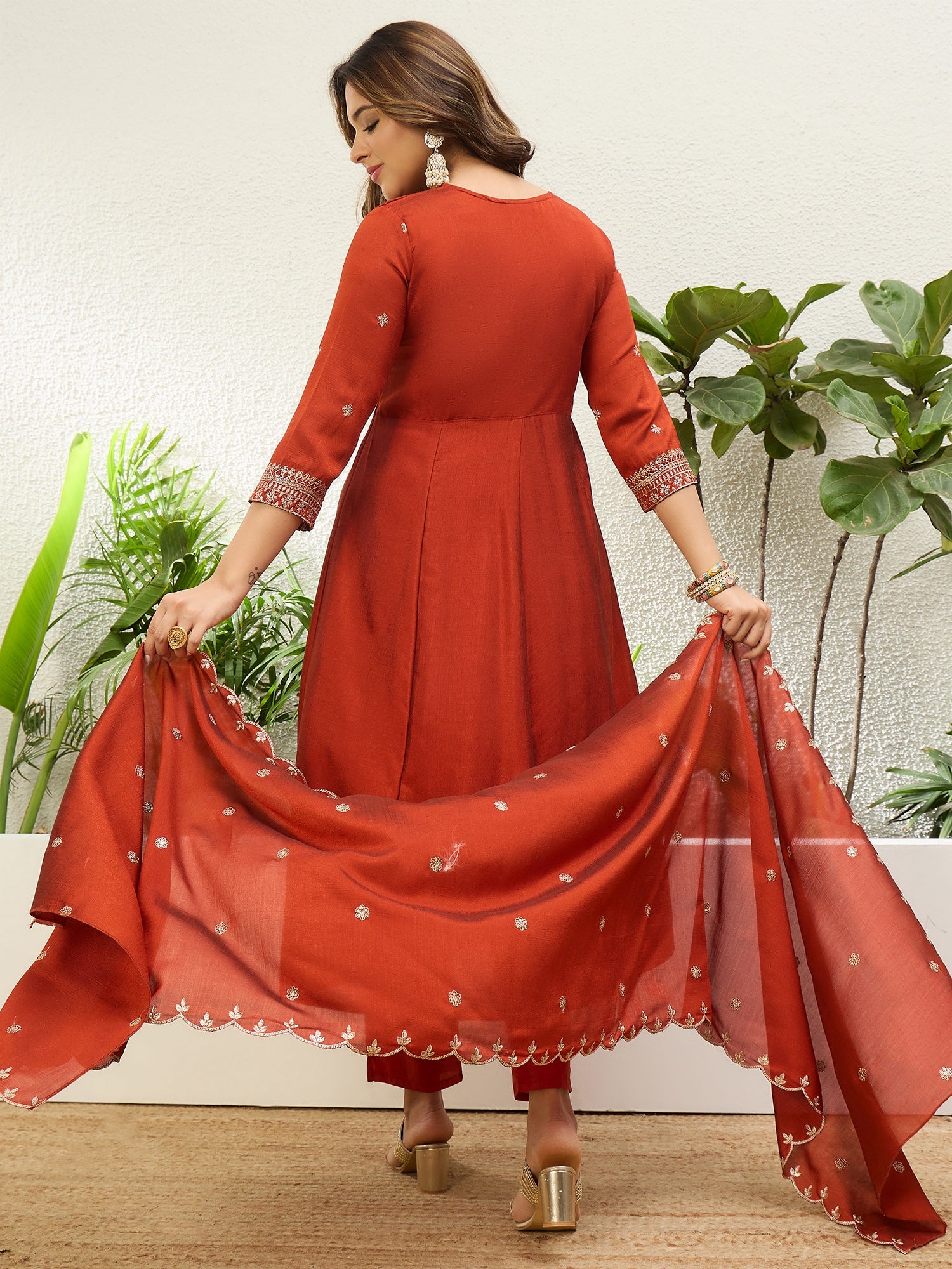 Vasundhara Women's Rust Red Embroidered Neckline Anarkali Kurta Set