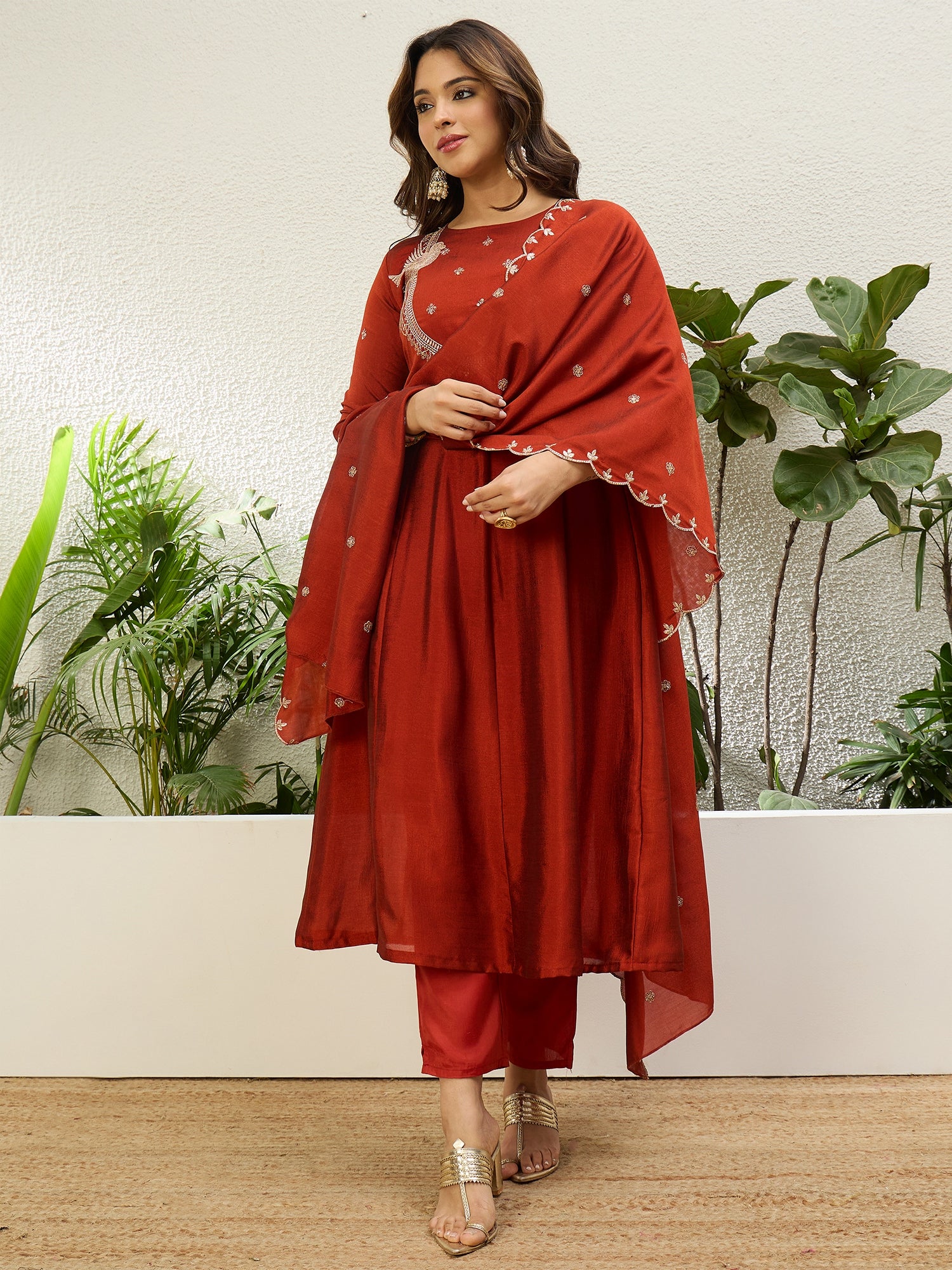 Vasundhara Women's Rust Red Embroidered Neckline Anarkali Kurta Set
